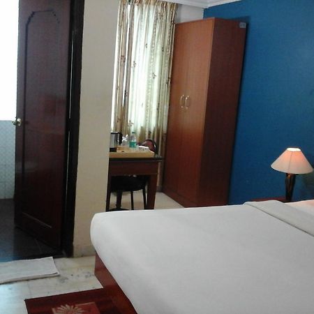 Hotel Pigeon International Bangalore Bagian luar foto