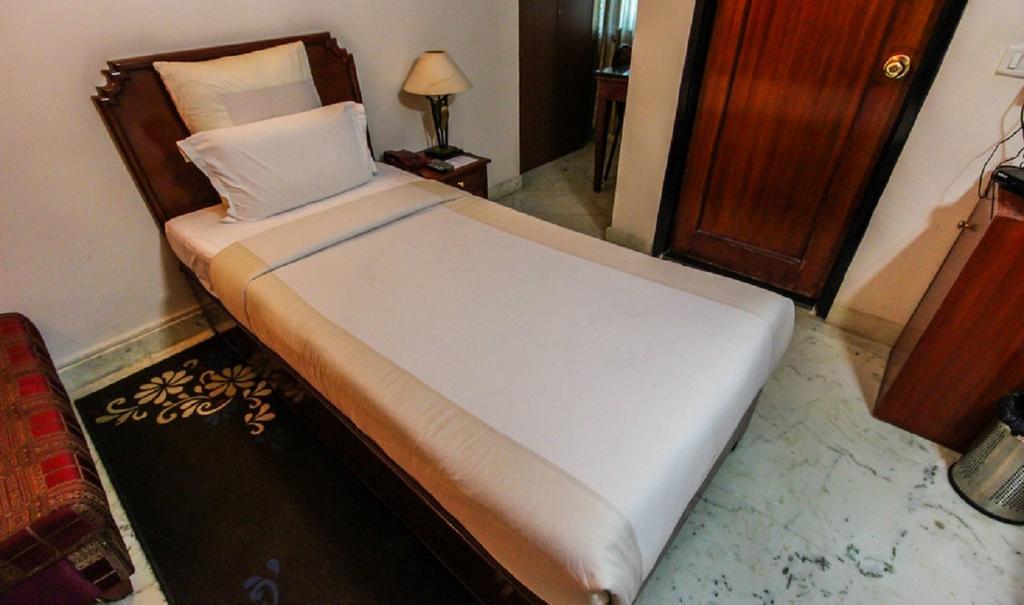 Hotel Pigeon International Bangalore Ruang foto