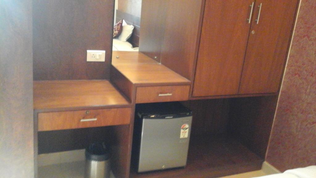 Hotel Pigeon International Bangalore Bagian luar foto