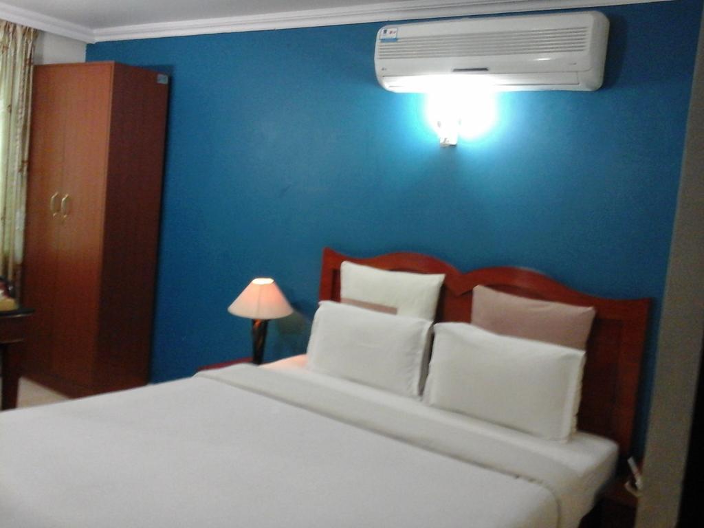 Hotel Pigeon International Bangalore Ruang foto