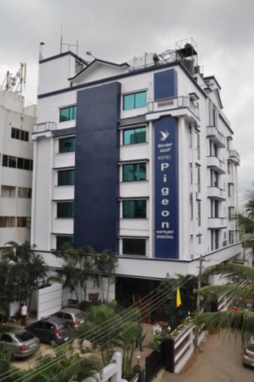 Hotel Pigeon International Bangalore Bagian luar foto