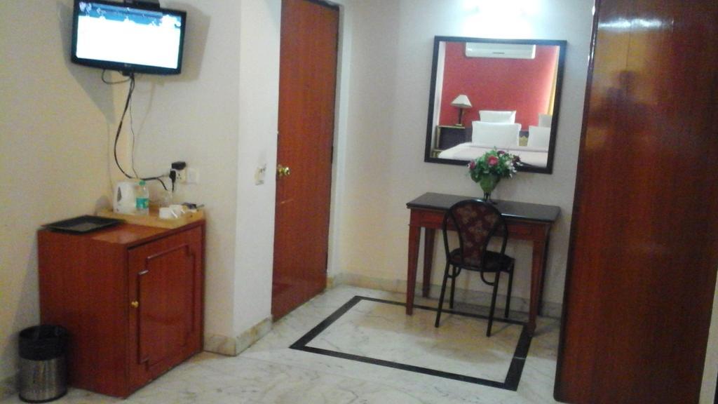 Hotel Pigeon International Bangalore Bagian luar foto