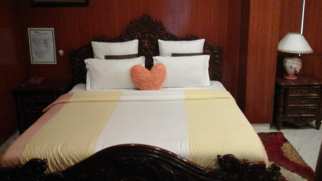 Hotel Pigeon International Bangalore Ruang foto